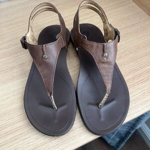 Olukai’s women’s sling back sandals size 9